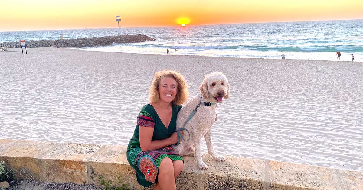 Gill Kenny and her dog at the beach